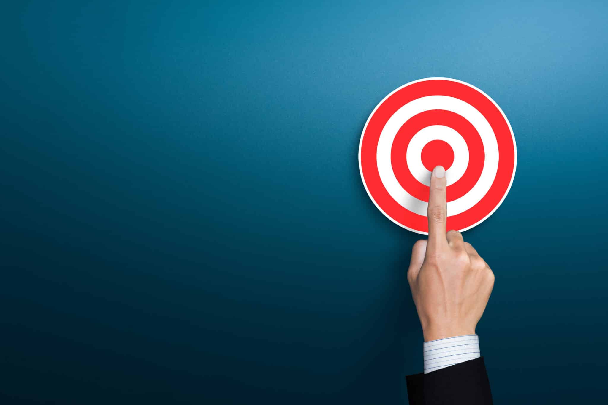 Businessman hand pointing to the target. business goal achieveme